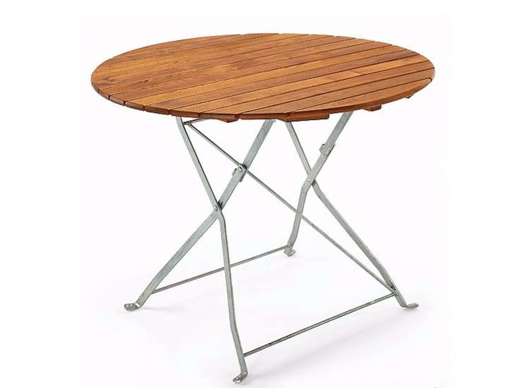 10 Easy Pieces Round Wooden Dining Tables Gardenista Beer Garden Round Outdoor Dining Table Gardenista