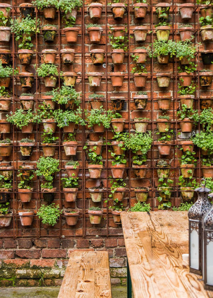 Design Sleuth: Vertical Garden of Terra Cotta Pots - Gardenista