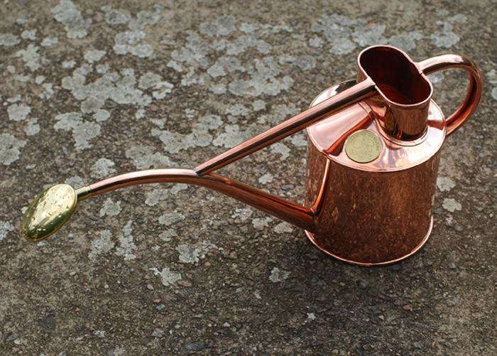 Alchemy In The Garden Metallic Watering Cans Gardenista
