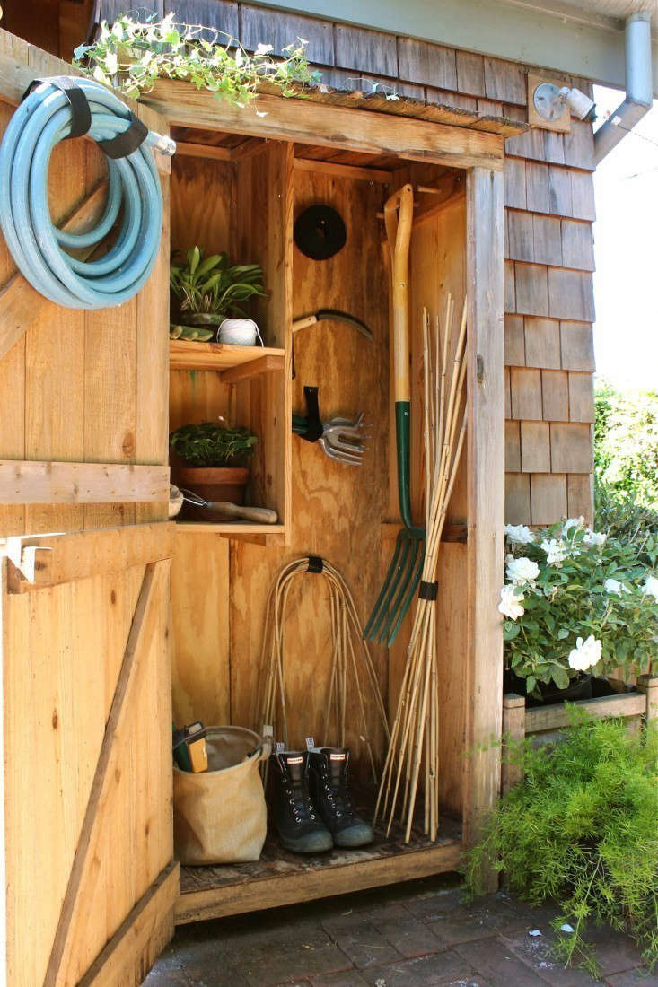 Remodelista editor in chief Julie Carlson has a tiny DIY kit shed in her garden in Mill Valley, California. Photograph by Michelle Slatalla.