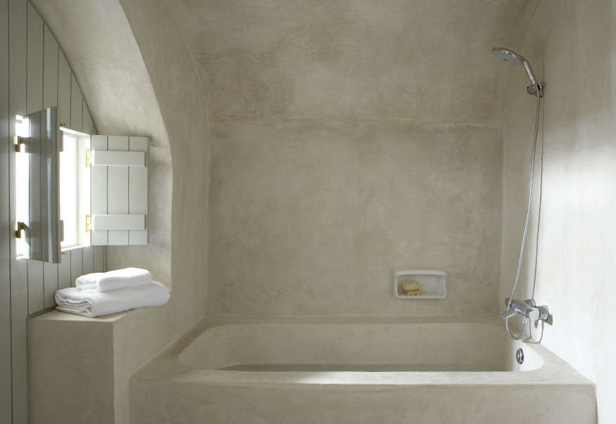 A tadelakt bath, as seen in Villa Fabrica: Serenity in Santorini.