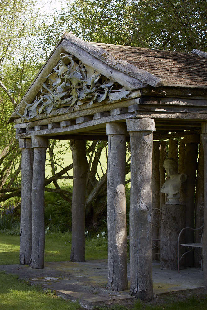 After taking several courses with Rosemary Verey at Barnsley House, Jessica Dickinson mastered the art of good structural design as well as horticultural technique temple and put the principles into play in the gardens at nearby Wortley House. Photograph by Britt Willoughby Dyer. For more, see Garden Visit: A Modern Garden for a Gothic Estate in the Cotswolds.