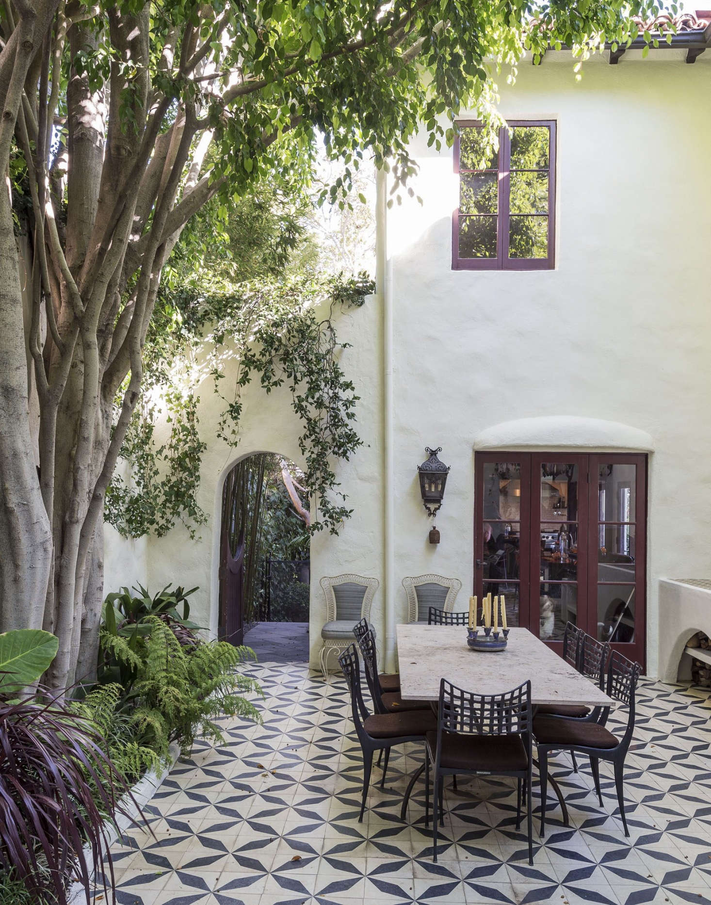 A tiled courtyard in Los Angeles is an indoor-outdoor dining room.