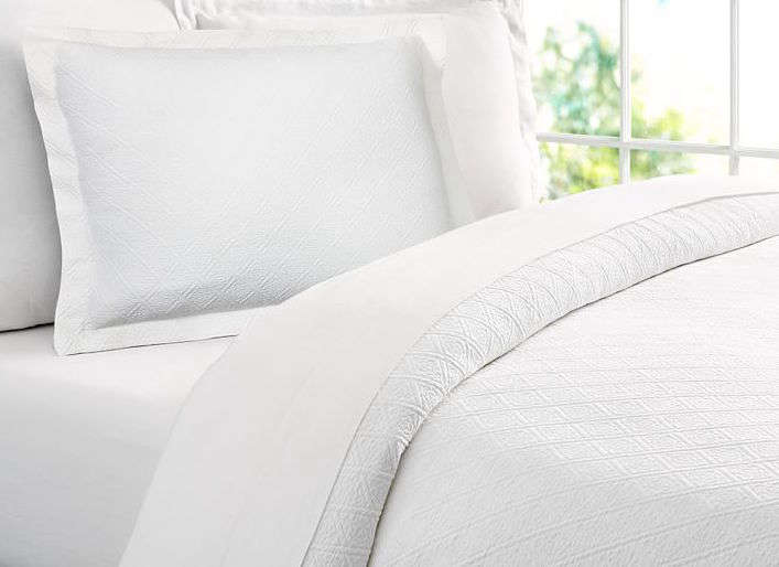 Pottery Barn offers a range of Portuguese Reeve Matelasse organic bedding; the full/queen Reeve Duvet Cover is $9 and the Reeve Sham is $49.50.