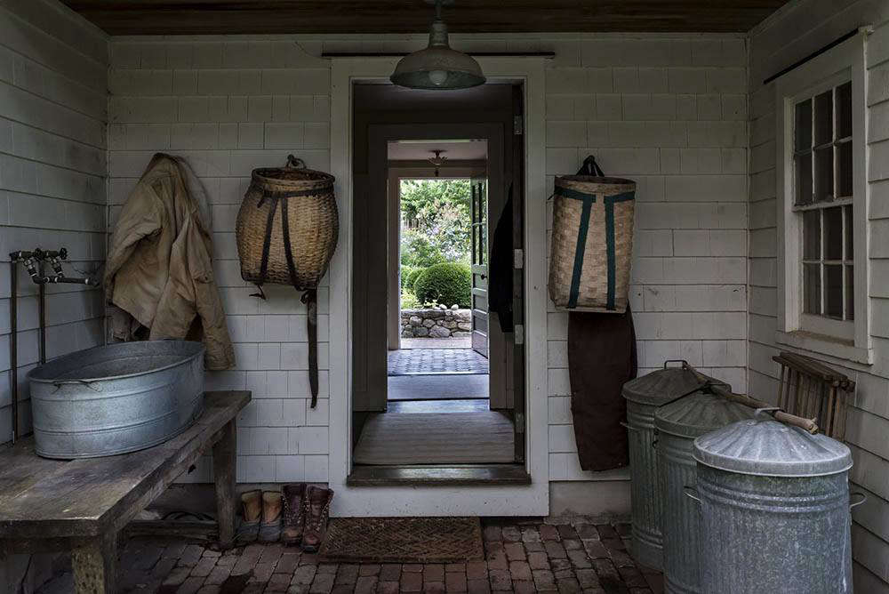 The other enfilade, leading from the back of the house to the front, directing the eye through the barn, to the woods on the hill.