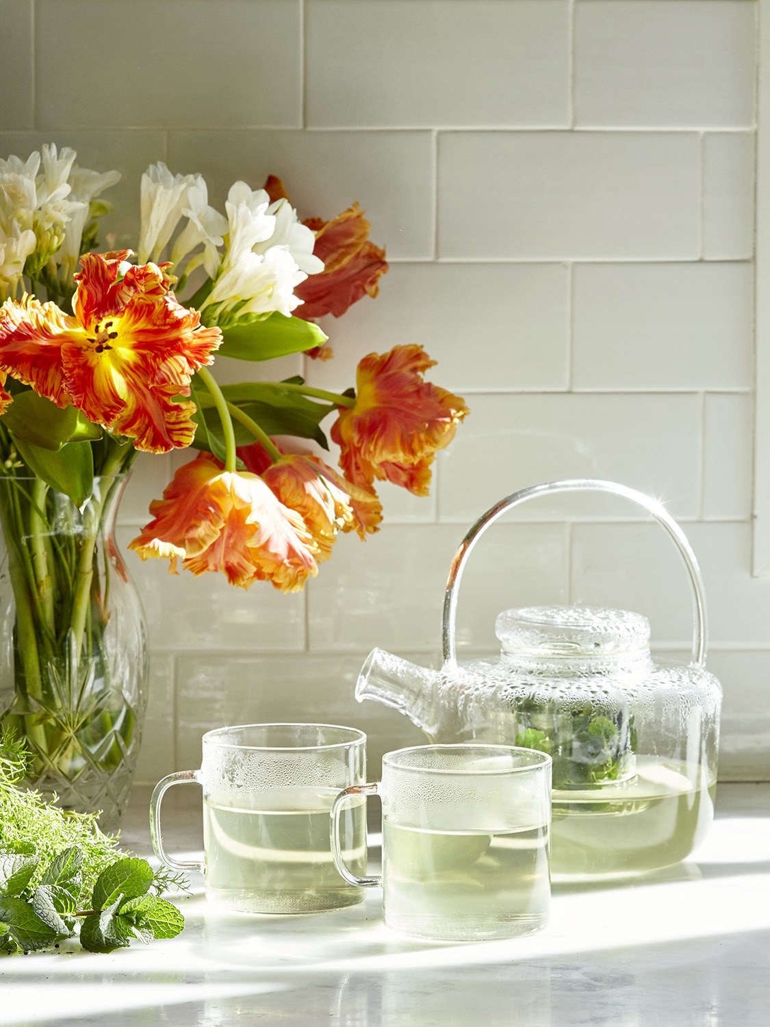 We brewed a pot of mint tisane using one large handful of rinsed leaves and stems.