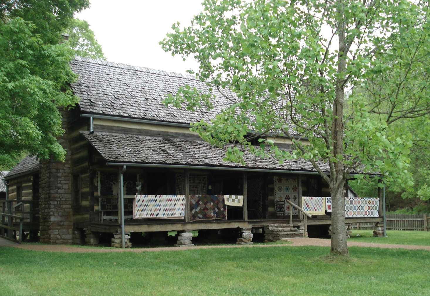 A quilting bee at Homeplace 50s Working Farm and Living History Museum. Photograph by Land Between the Lakes via Flickr.