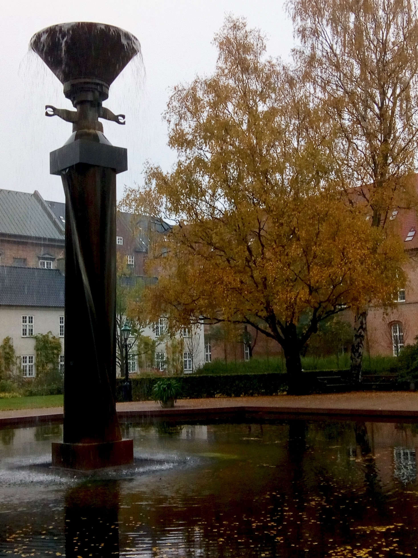 A shallow water feature at the Royal Library Garden in Copenhagen creates a peaceful atmosphere. Photograph by Bogdan Shuba via Flickr.