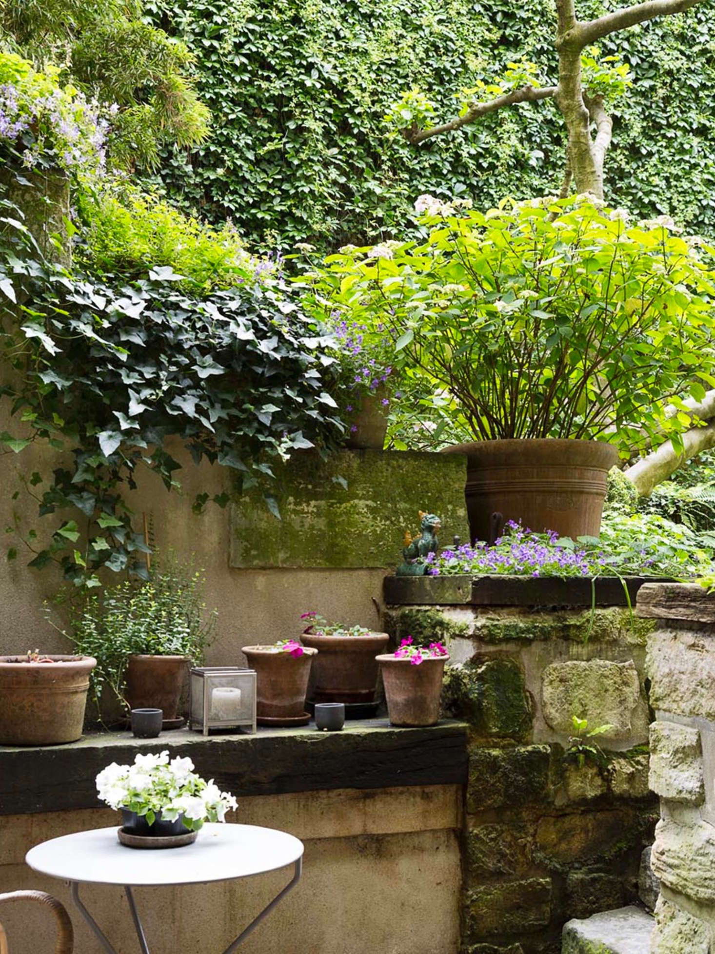 After purchasing the apartment, Pillsbury and her husband demolished an old stable and re-used the stones to create a terrace and garden walls.