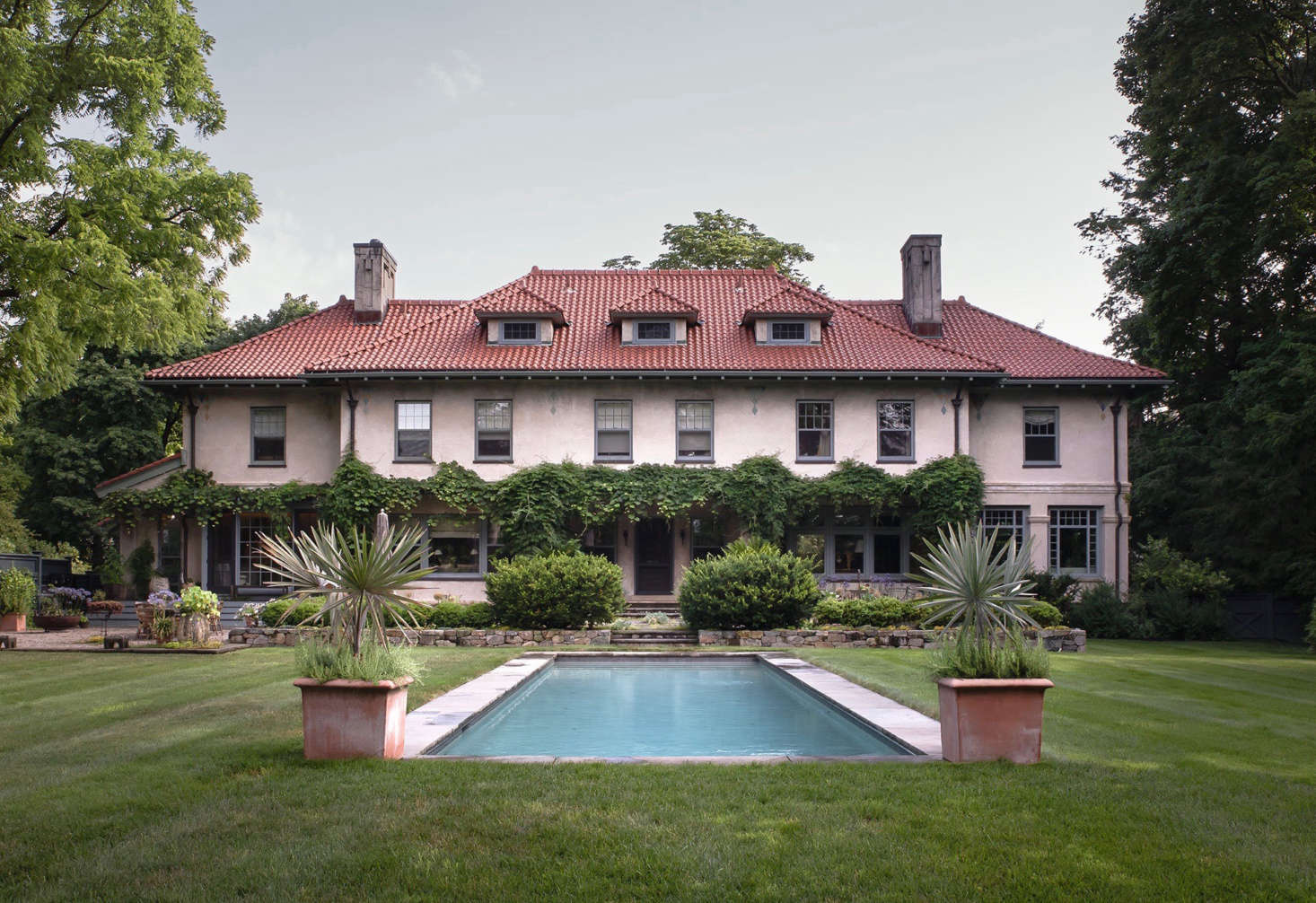 Matching the scale and architecture of the house, the pool feels as if it has always been there.