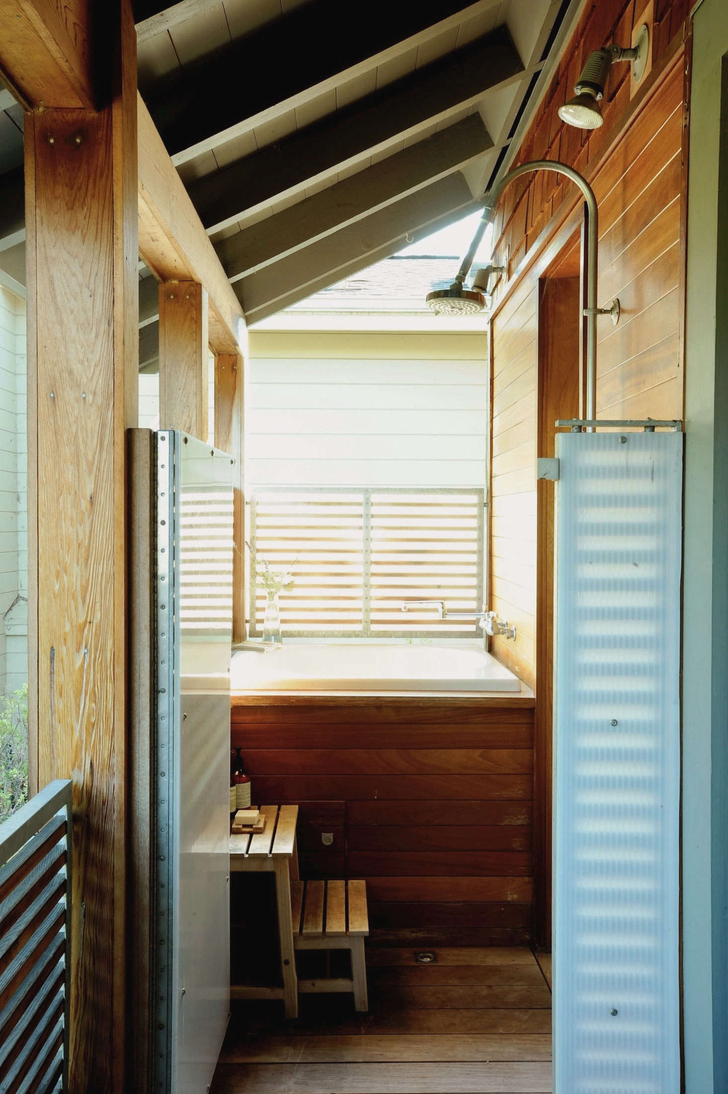 In Remodelista editor-in-chief Julie Carlson’s outdoor shower in Mill Valley, architect Jerome Buttrick spec’d Polygal’s Co-Extruded Polycarbonate Panels to create privacy while letting light through. Photograph by Matthew Williams for Remodelista. See more at Garden Hacks: 10 Ideas Under $100 to Create Instant Privacy.