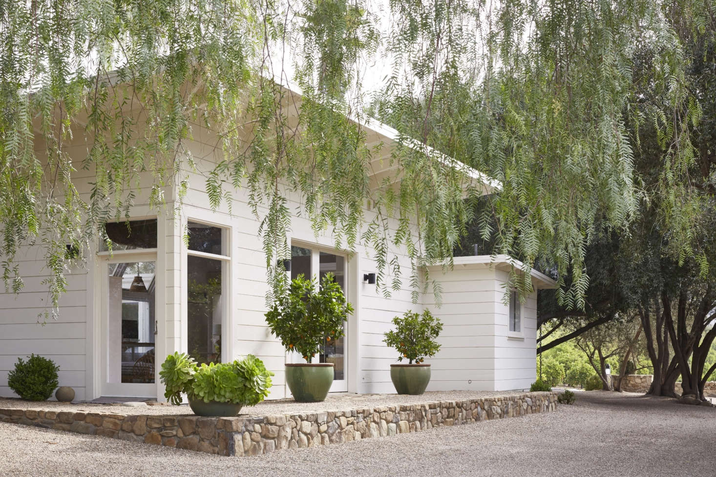 The exterior of the studio. Just as she did inside, Pearson kept the garden simple: 